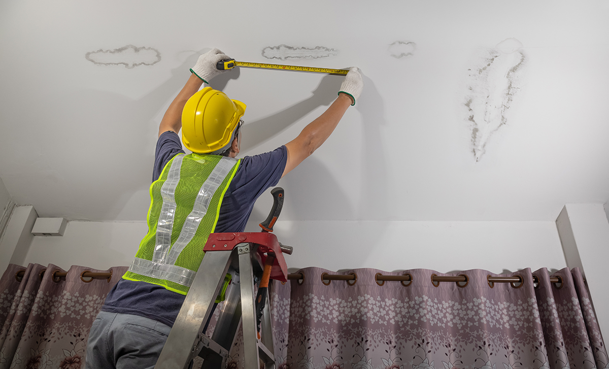 Image of water damage to ceiling caused by damaged roofing