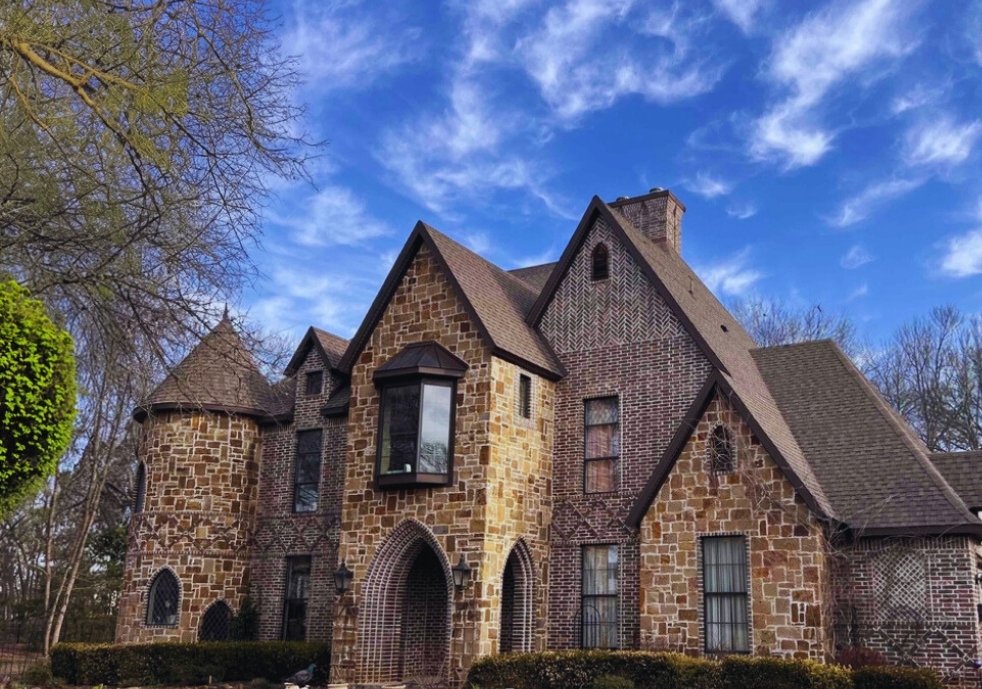 top of home shown from drone with grey roof